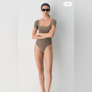 Aritzia Cola Taupe Short Sleeve Bodysuit